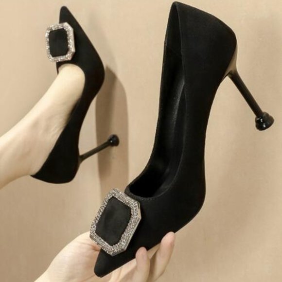 DREAM PAIRS Women A pair of high heels
